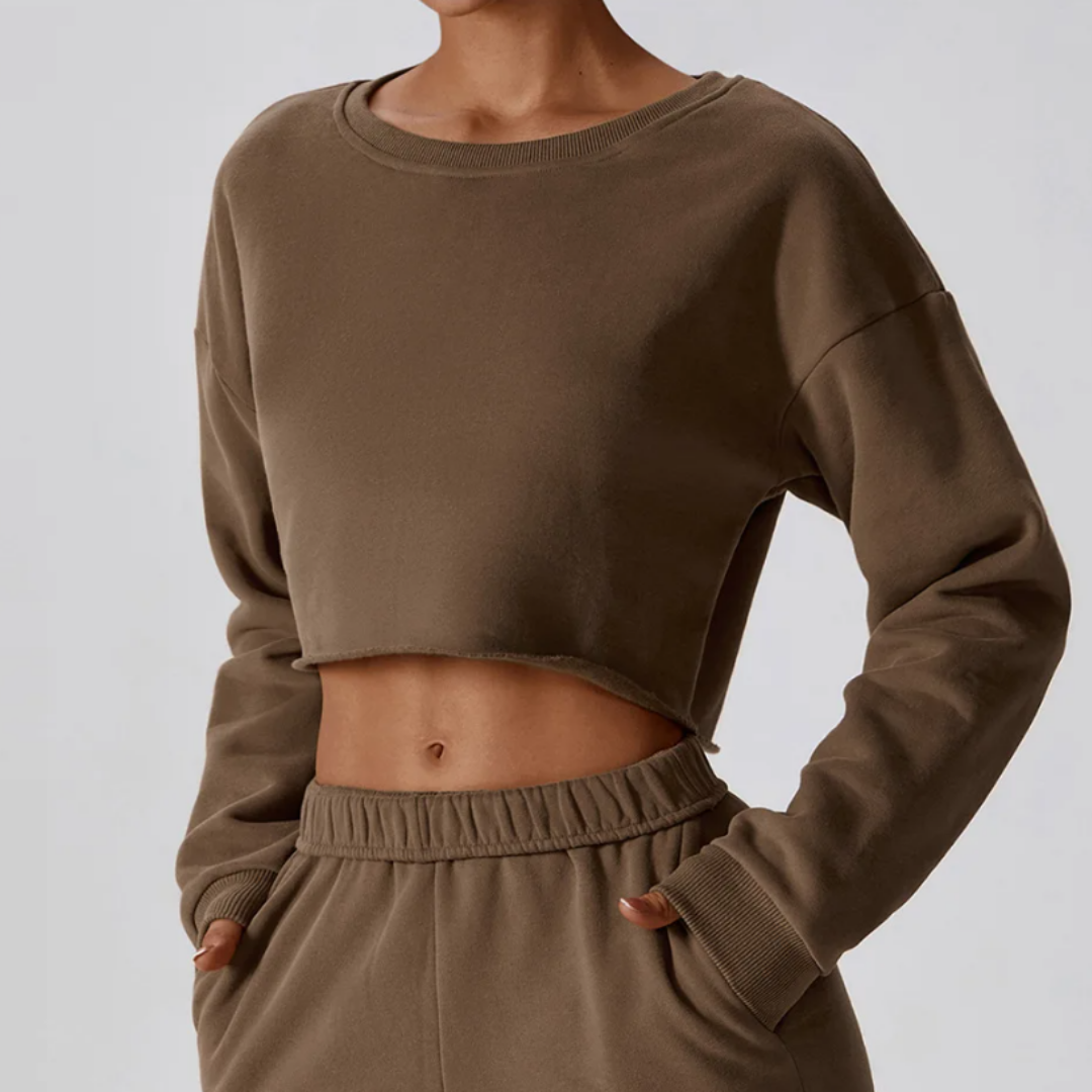 Kira Long Sleeve Shirt: Elevate Loungewear with Comfort and Style - Raw Hem Detail, Cropped Design, and Cotton Comfort for Effortless Chic in Every Moment. From Relaxed Lounging to Active Pursuits, Embrace Versatility in Your Wardrobe.