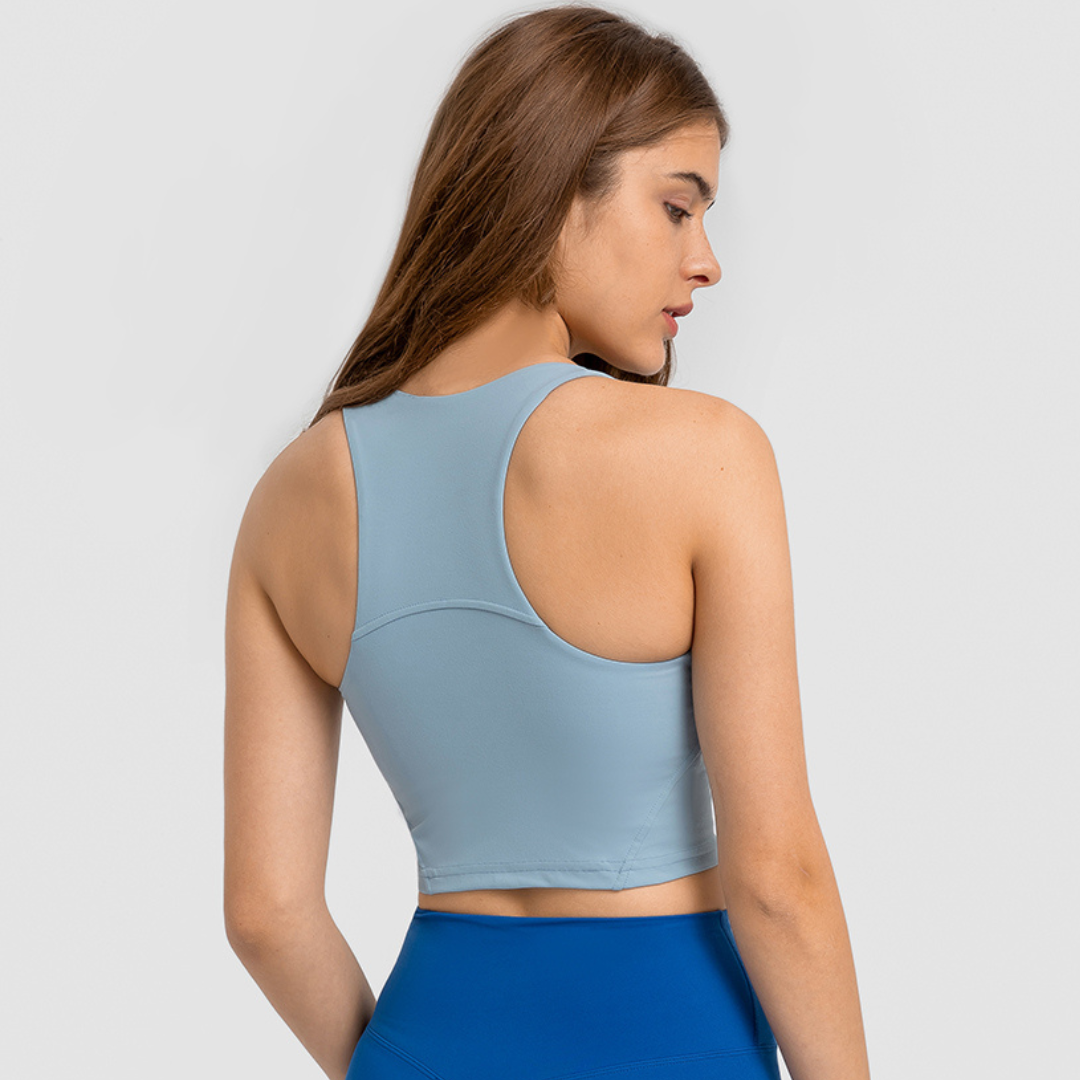 Venice Crop - Women's gym singlet made from a breathable and sweat-wicking nylon/spandex blend, featuring a built-in sports bra for maximum support and comfort. Stylish, cropped, and fitted design for both streetwear and gym wear, ensuring you look and feel your best during intense workouts.
