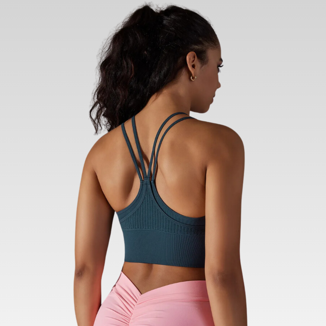 Andorra Yoga Singlet – Comfort and style redefined. Premium nylon/spandex blend for ultimate flexibility and a soft touch. Breathable design for a refreshing flow in your yoga practice. Built-in sports bra for seamless support. Versatile style transitions effortlessly from the mat to everyday life. Elevate your yoga experience with the Andorra Singlet.