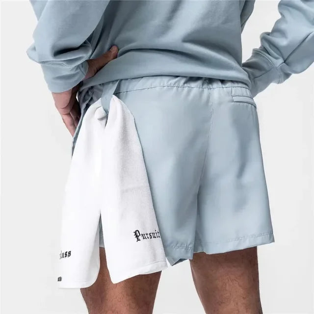 The Isaiah Shorts - Crafted from a Nylon/Poly blend for ultimate comfort. Adjustable drawstring waist, functional pockets, and a belt loop for added convenience. Elevate your casual wardrobe with these stylish and comfortable shorts.
