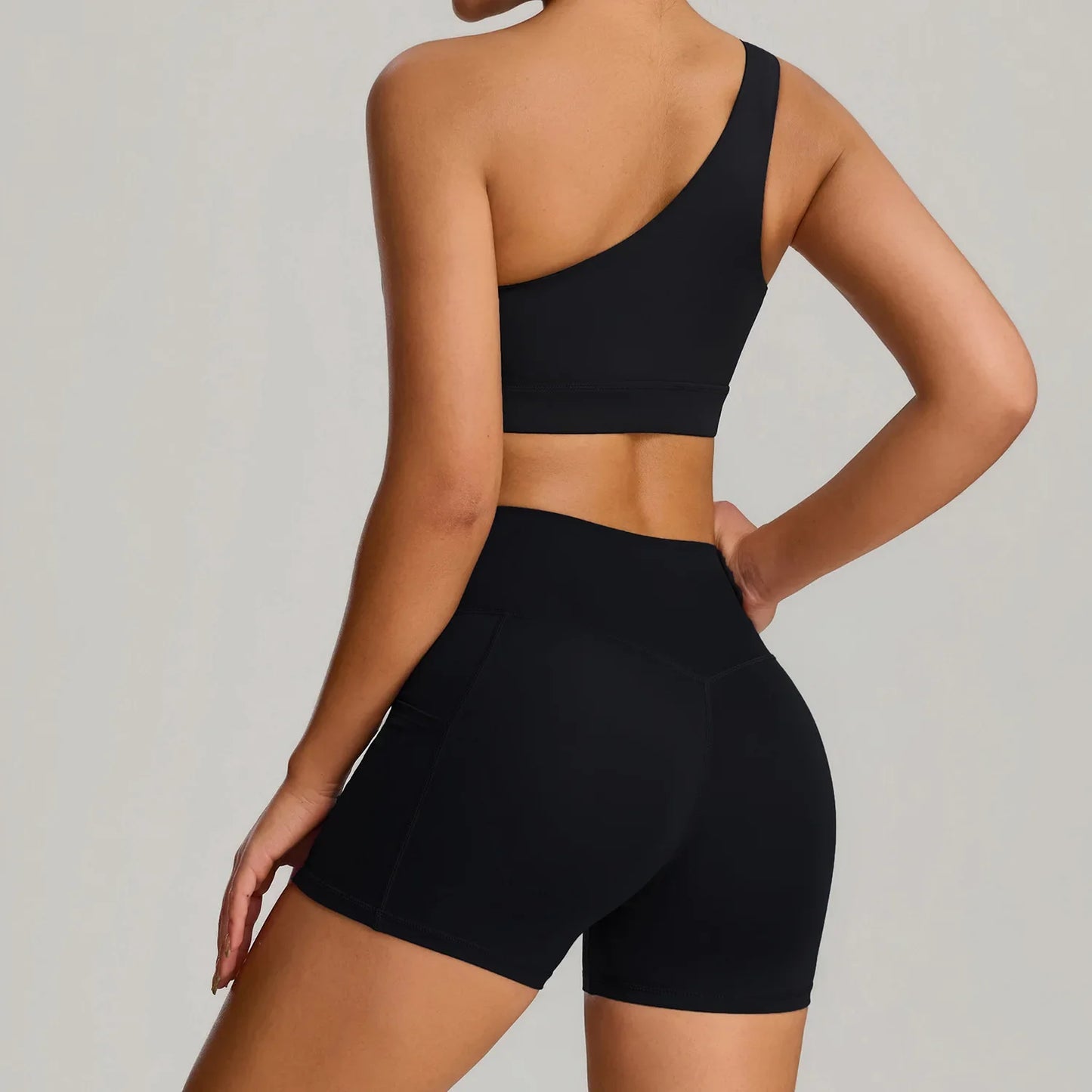 THE MURMUR ONE-SHOULDER SPORTS BRA AND SHORTS SET