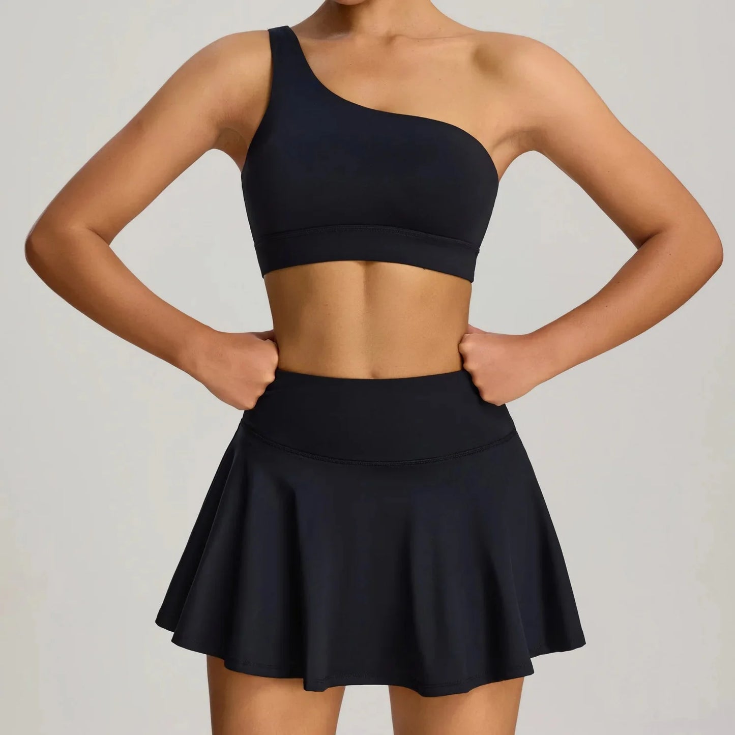 THE MURMUR ONE-SHOULDER SPORTS BRA