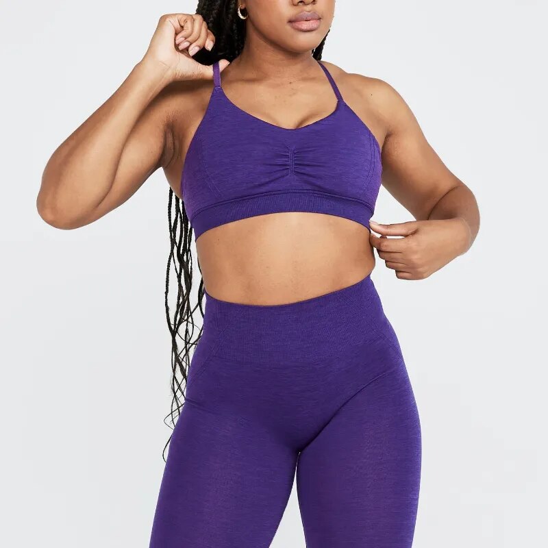 Callista Cross-Back Sports Bra: High-performance nylon/spandex blend for support in challenging workouts. Breathable design, quick-dry technology, and seamless comfort for unbeatable confidence in your fitness journey.