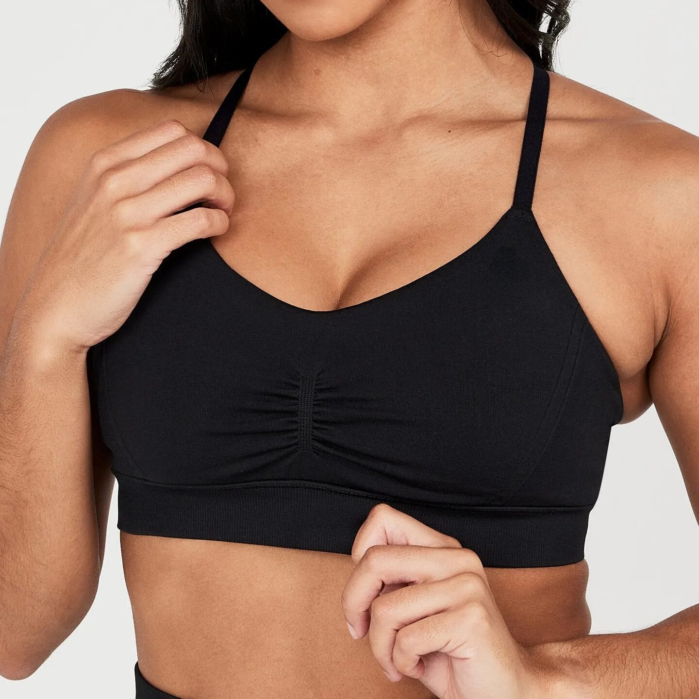 Callista Cross-Back Sports Bra: High-performance nylon/spandex blend for support in challenging workouts. Breathable design, quick-dry technology, and seamless comfort for unbeatable confidence in your fitness journey.