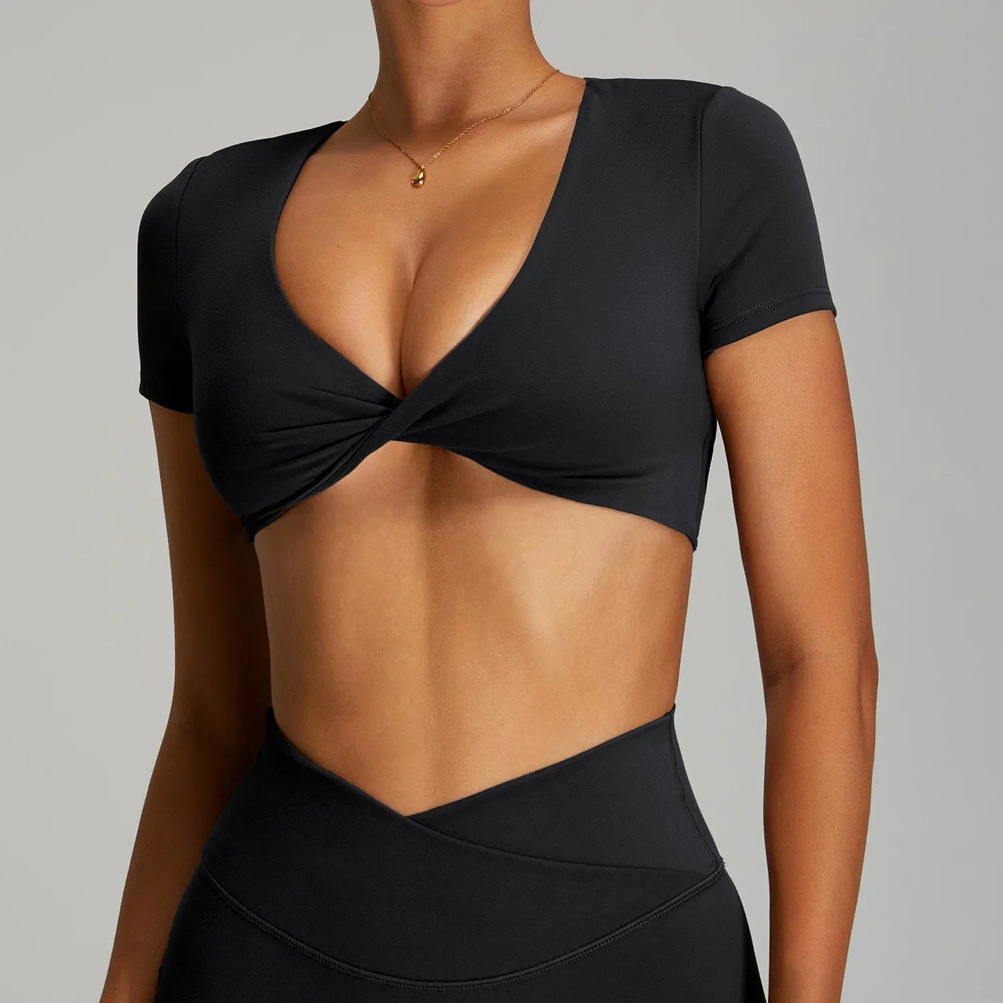 GLOWLINE CROPPED TWIST FRONT TEE