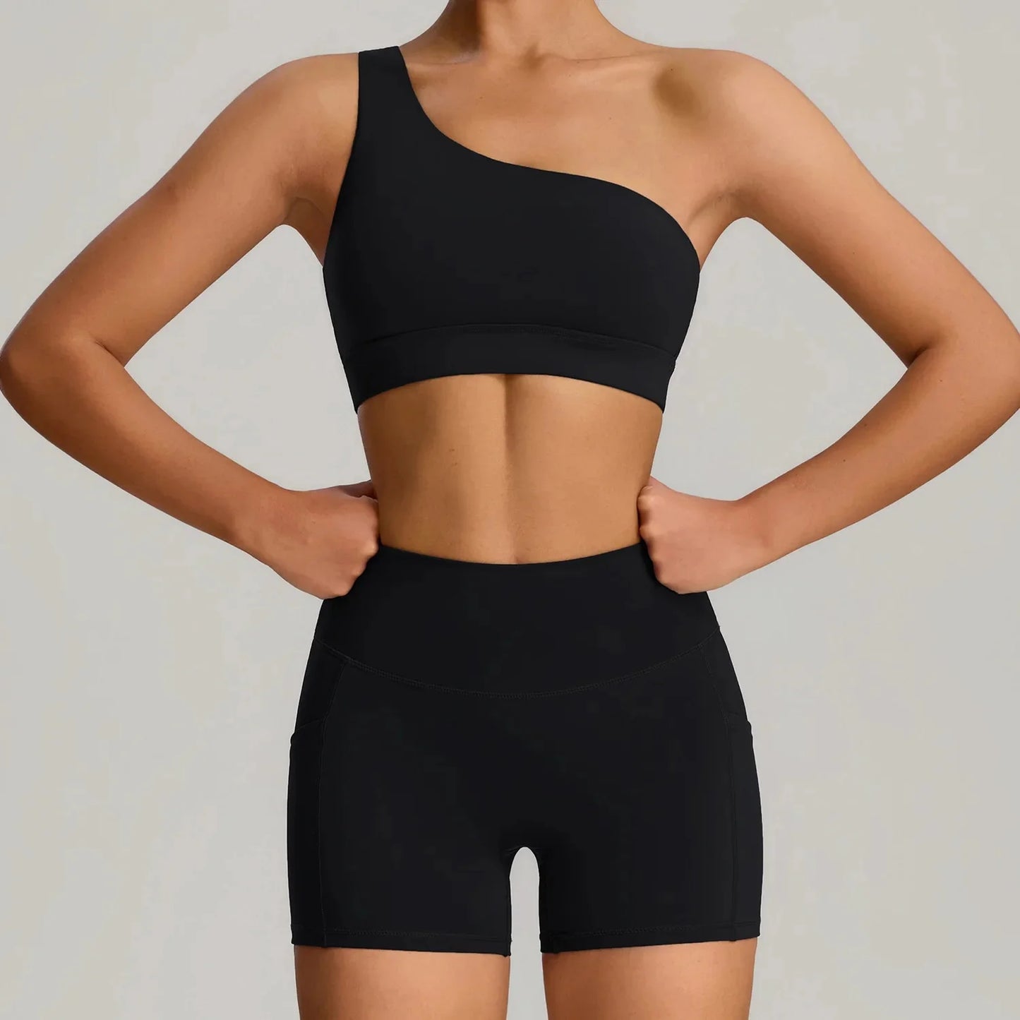 THE MURMUR ONE-SHOULDER SPORTS BRA AND SHORTS SET
