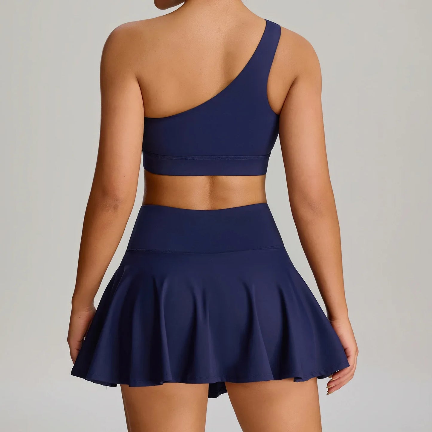 THE MURMUR ONE-SHOULDER SPORTS BRA