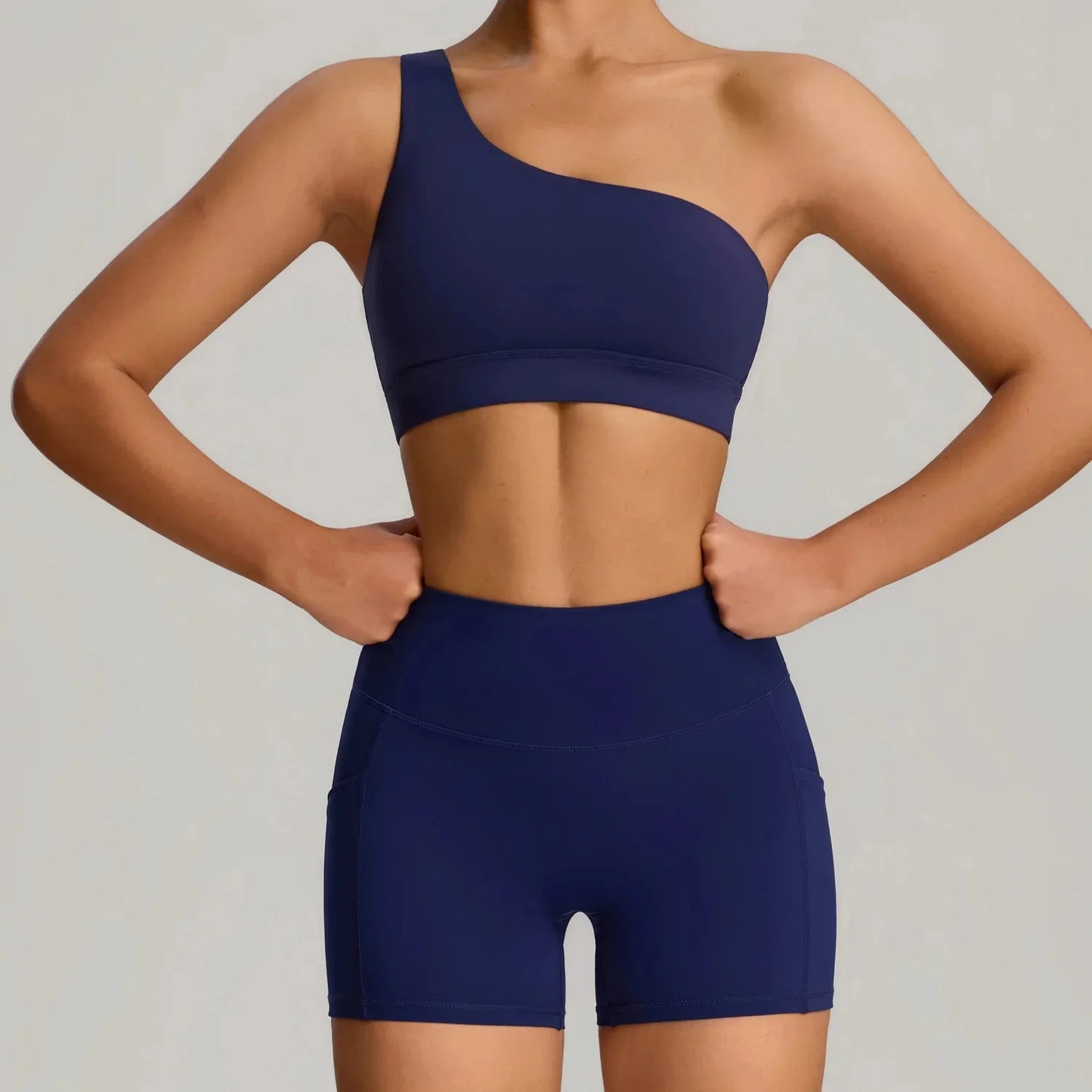 THE MURMUR ONE-SHOULDER SPORTS BRA AND SHORTS SET