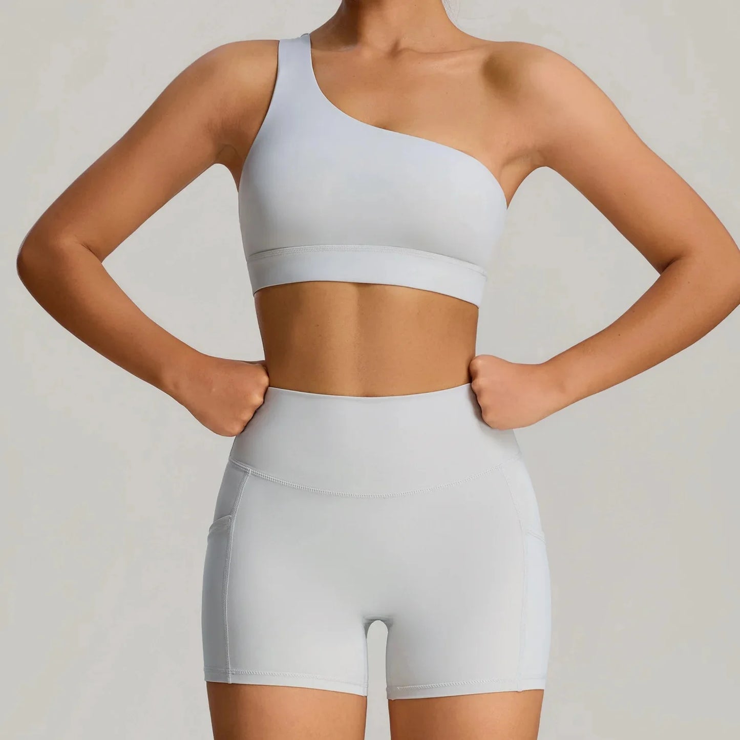 THE MURMUR ONE-SHOULDER SPORTS BRA AND SHORTS SET