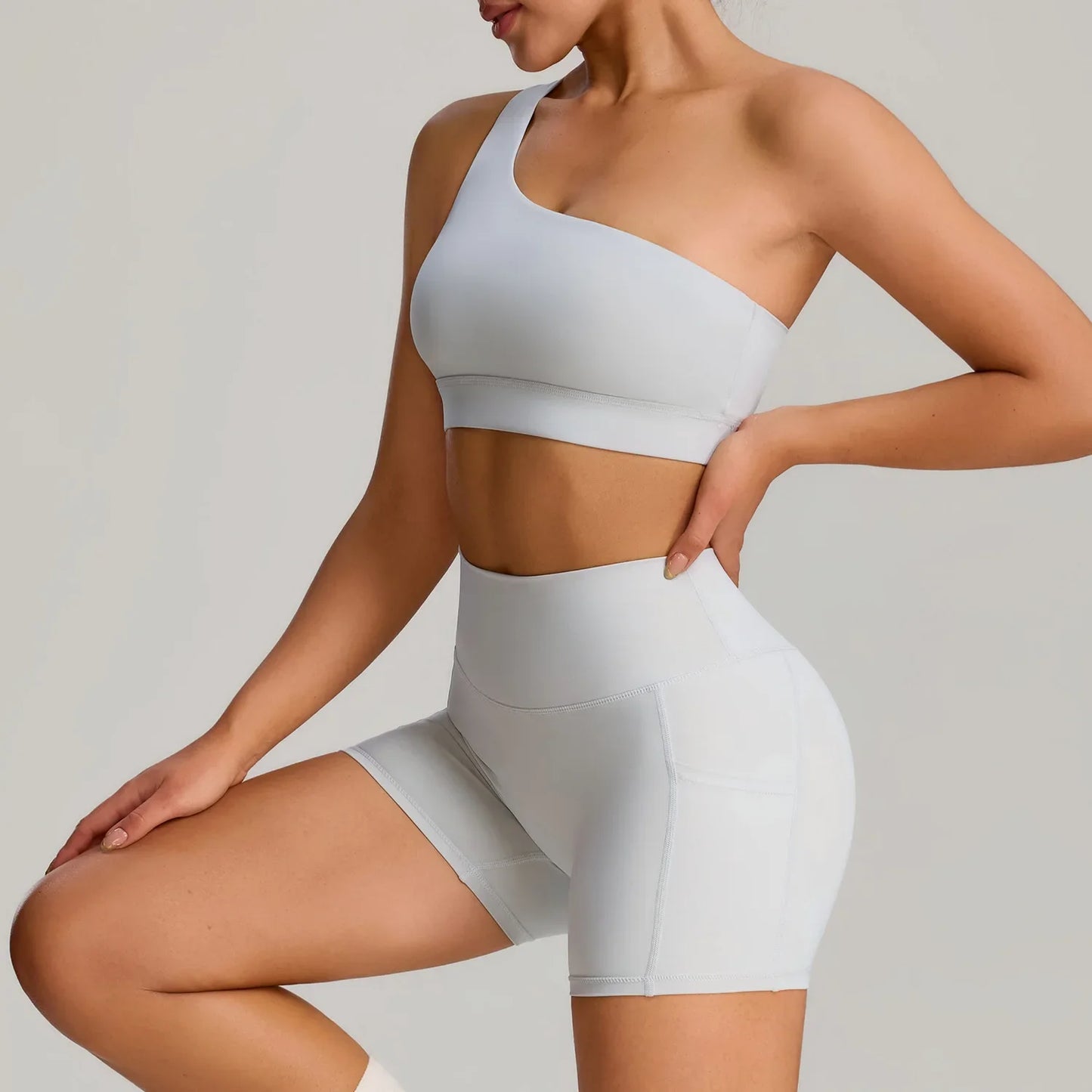 THE MURMUR ONE-SHOULDER SPORTS BRA AND SHORTS SET