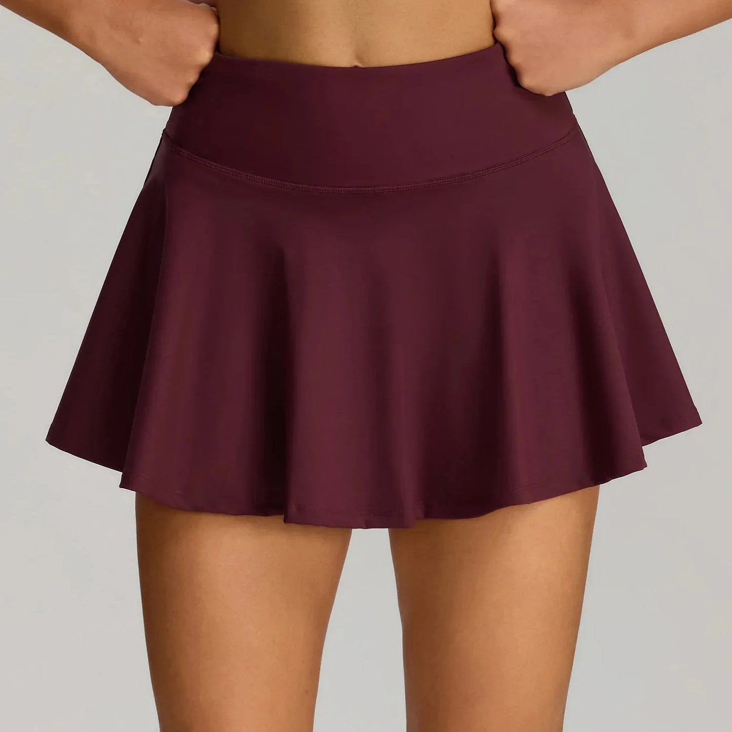 THE MURMUR ONE-SHOULDER SKORT SET