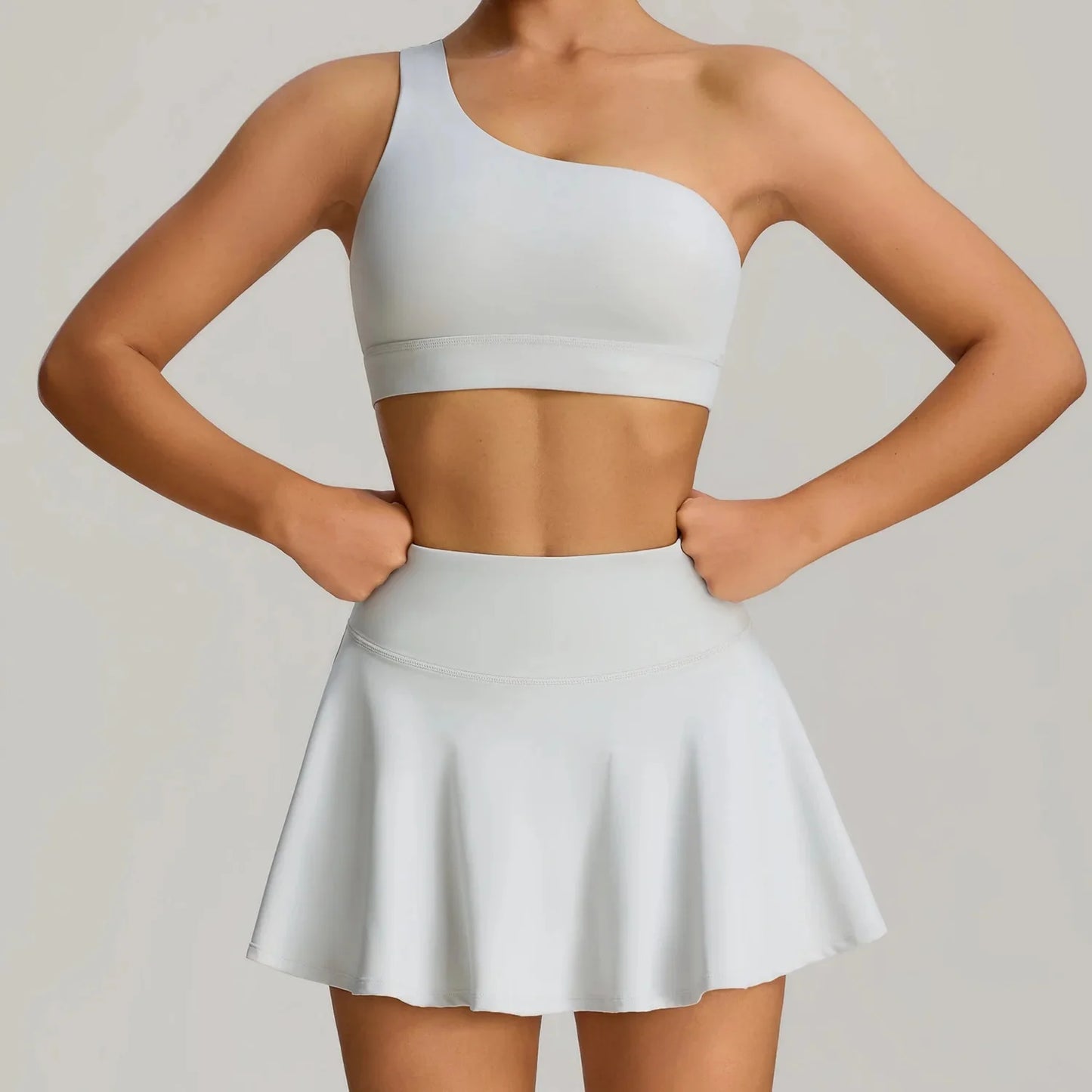 THE MURMUR ONE-SHOULDER SPORTS BRA
