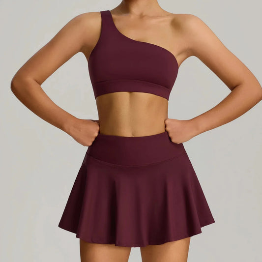 THE MURMUR ONE-SHOULDER SKORT SET
