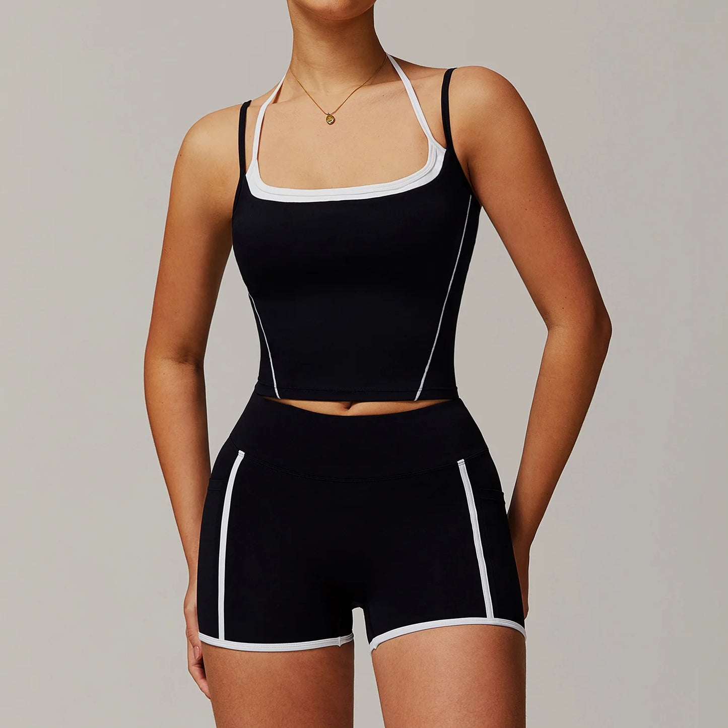 THE ISOLA COMPRESSION SINGLET & SHORTS SET