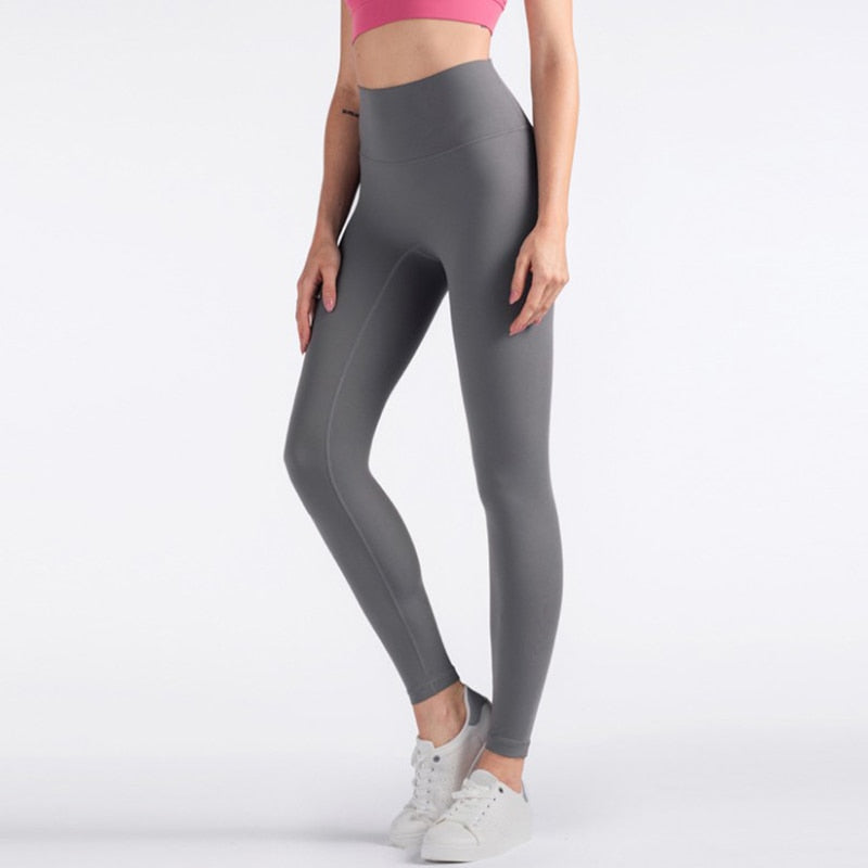  Back to Basics Yoga Pants - Comfortable, stylish, and confidence-boosting workout leggings. Silky soft, buttery material for maximum comfort and flexibility. Built to last with durable construction. High-waisted design flatters your figure and accentuates curves. Ideal for gym sessions, running errands, or relaxation at home. Elevate your workout wardrobe with these versatile and comfortable yoga pants.