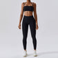 Ember Set - Elevate your fitness fashion with this stylish and functional two-piece activewear set. Made from a durable nylon/spandex blend, the set includes a sports bra with removable pads and high-waisted leggings. Stay comfortable, dry, and fashionable during your workout. Order now and ignite your fitness journey!